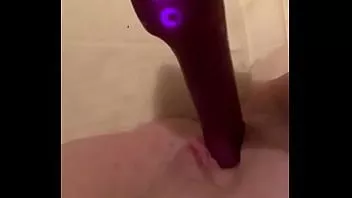Play Fucking my cunt with my purple vibrator